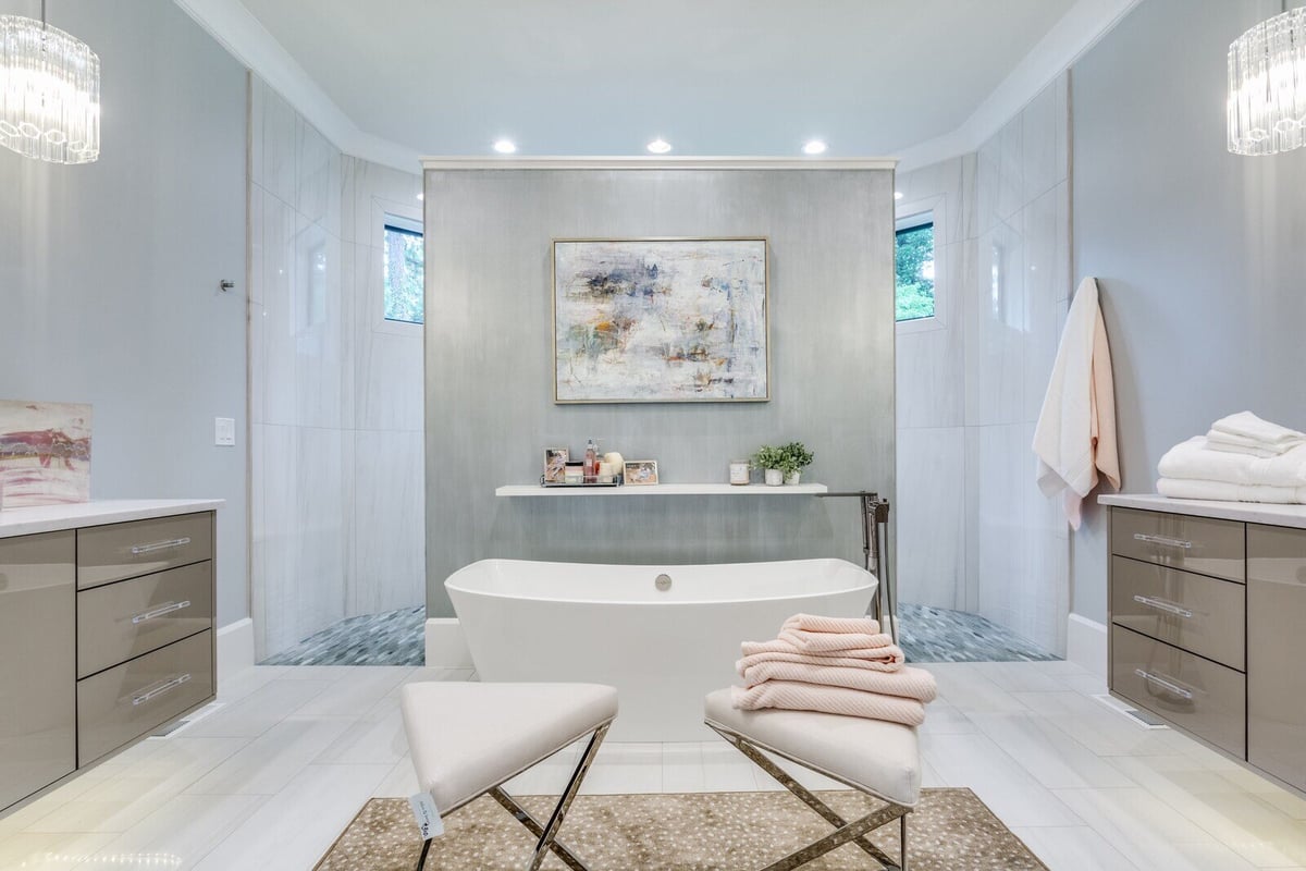 Luxurious custom bathroom in Greensboro, NC designed by Wolfe Homes with freestanding tub and modern decor