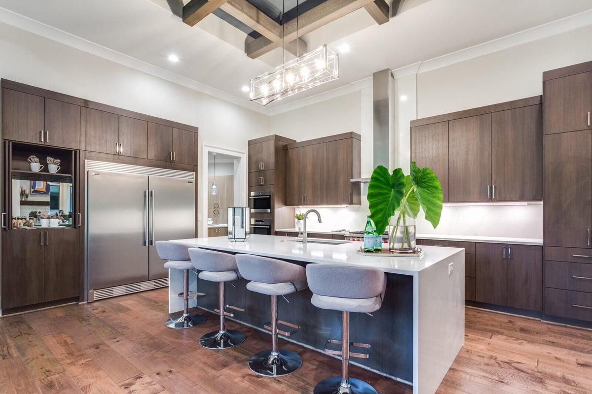 Spacious kitchen with modern island seating in Greensboro custom home by Wolfe Homes